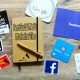 Best Social Media Marketing Tips: This pictures shows google, facebook, twitter, Instagram logo along with a notebook of marketing tips and a pen